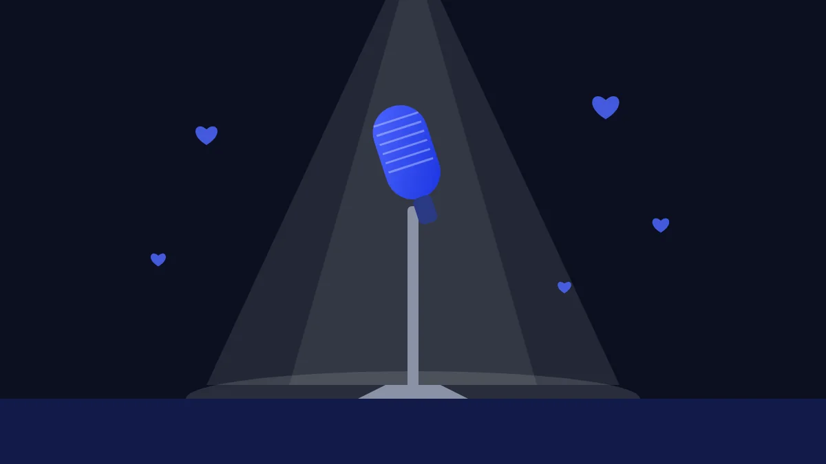 Microphone on a stand under a spotlight on a dark stage with small hearts in the air